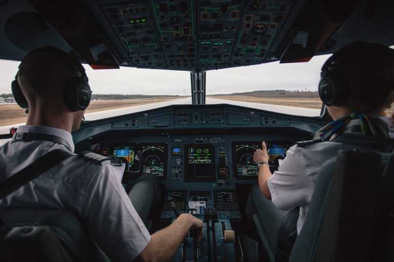 Pilots in Plane Getting Ready For Takeoff