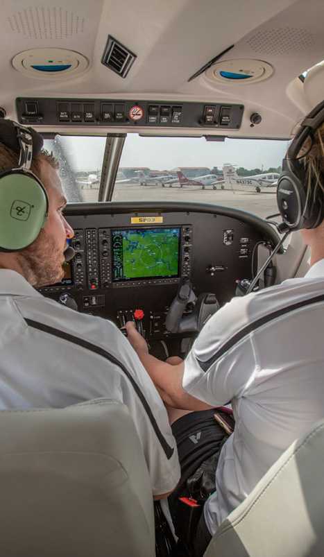 pilot and student in plane