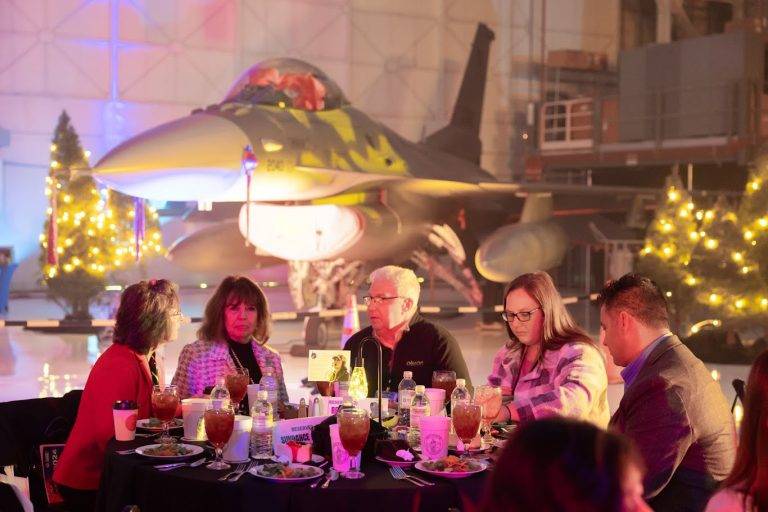 oklahoma women in aviation and aerospace day roses and wrenches event by plane
